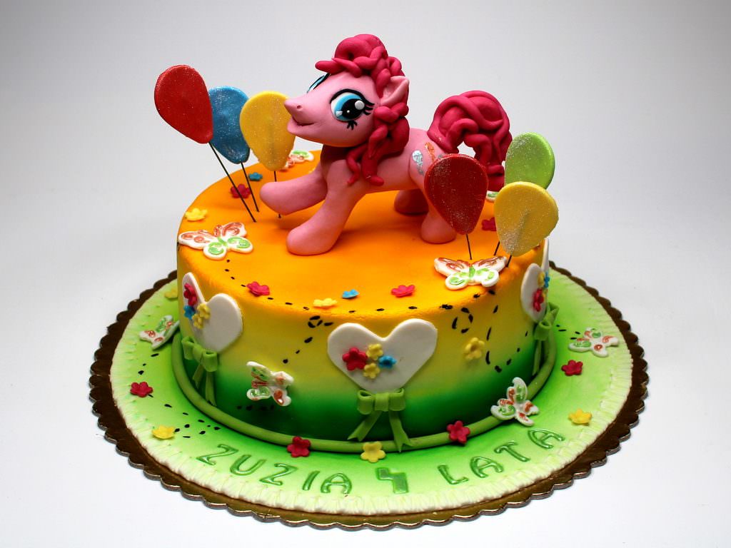 kids-birthday-cakes-kids-birthday-cake-delivery-in-pune-urban-fiesta-with-many-colors-like-orange-yellow-and-green-color-combination-1024x768