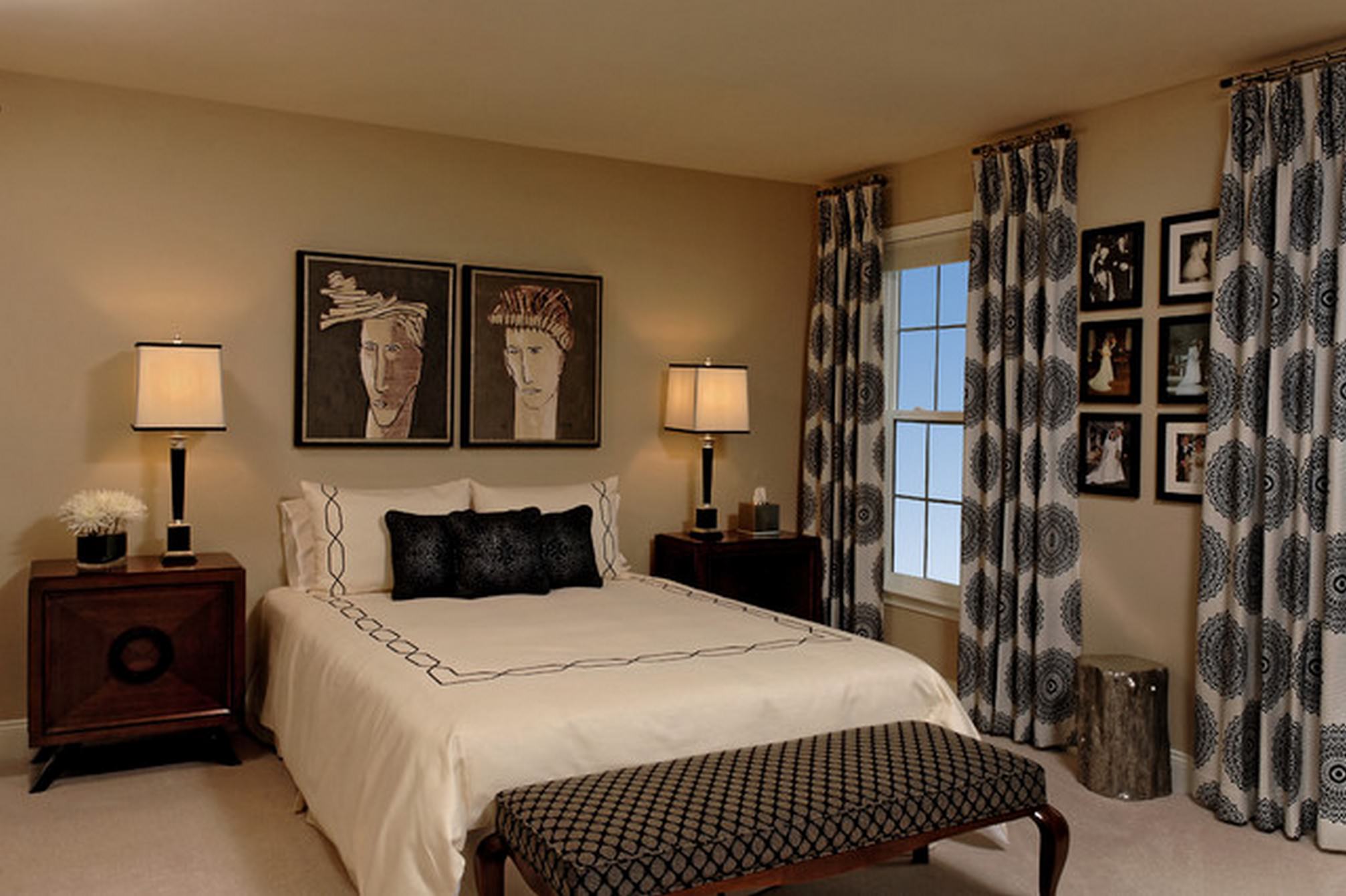 white-bedding-set-on-the-middle-of-brown-wooden-side-table-and-lamps-combined-with-white-black-curtain-with-circle-pattern-on-the-cream-wall-room