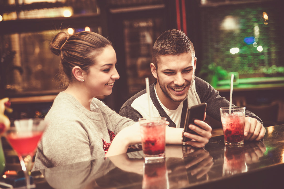 man-and-woman-drinking-at-the-bar
