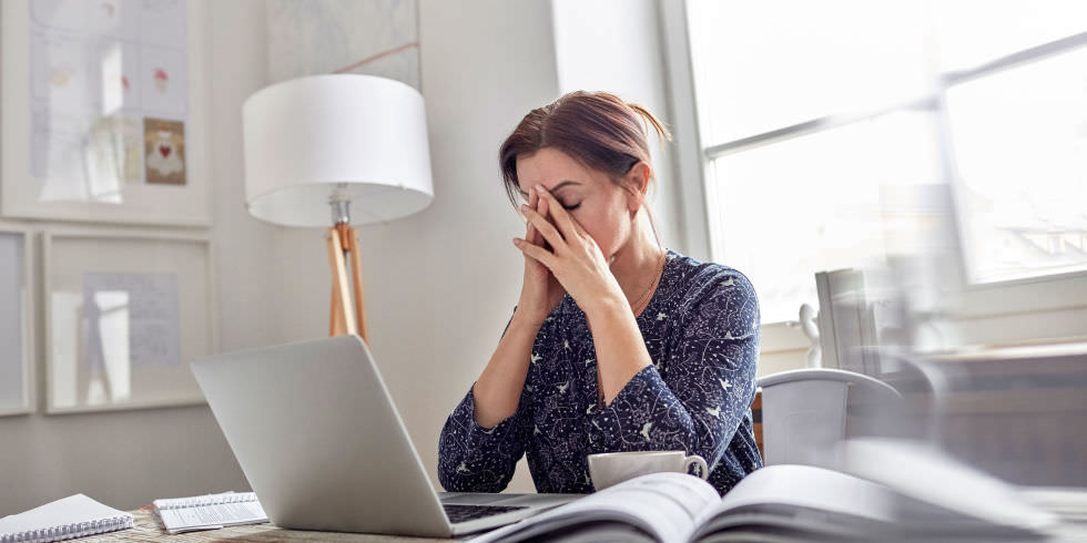 landscape-1504002912-tired-woman-at-work