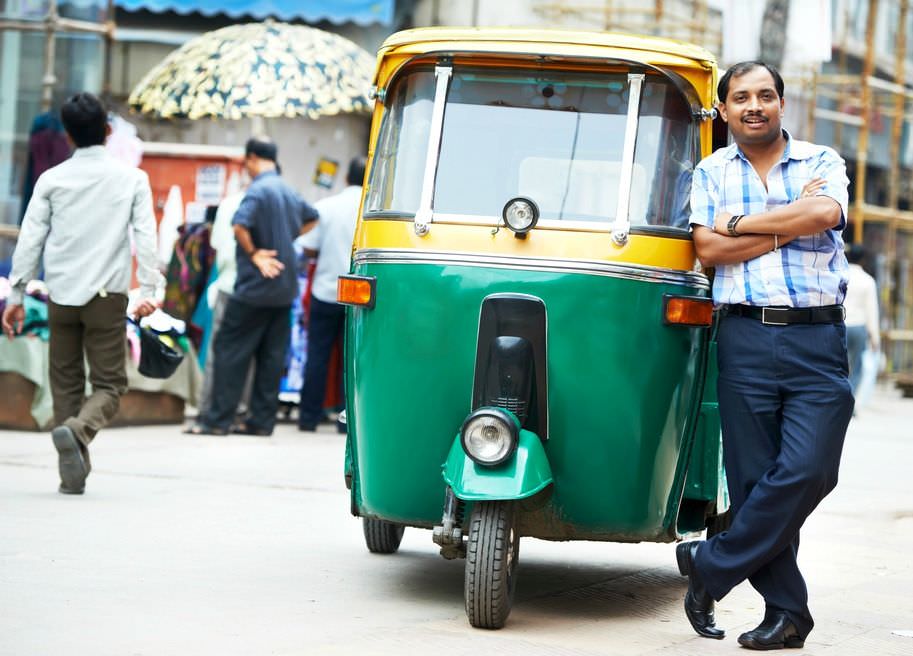 Indian auto rickshaw three-weeler tuk-tuk taxi driver man