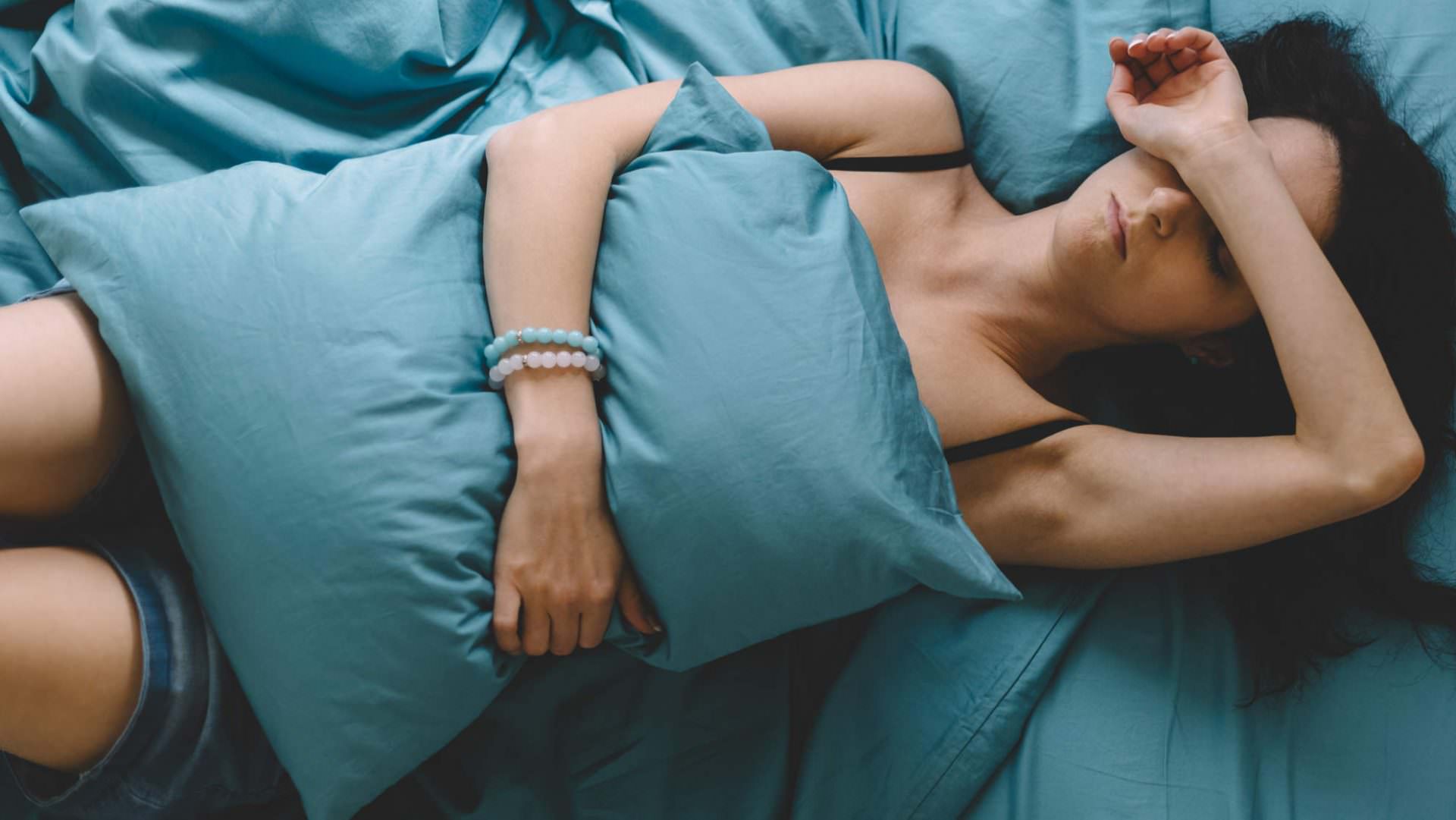 Sick woman in bed