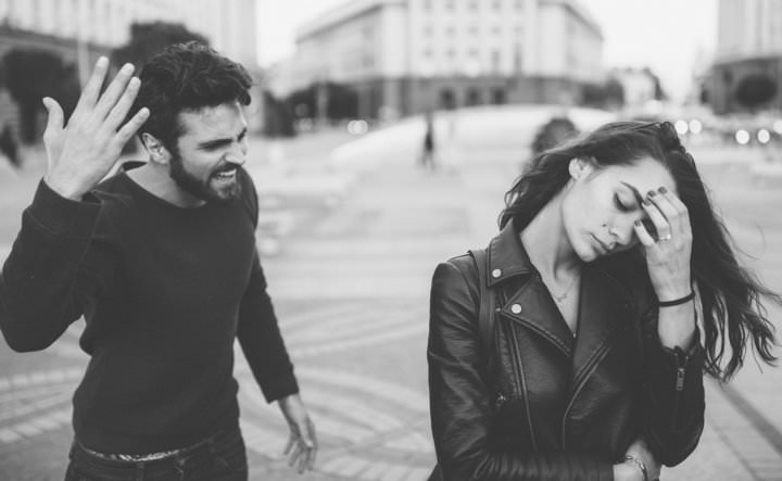 Young couple having a conflict at the street